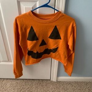 Juniors, jack-o-lantern, mid sweatshirt, size XS, great condition.